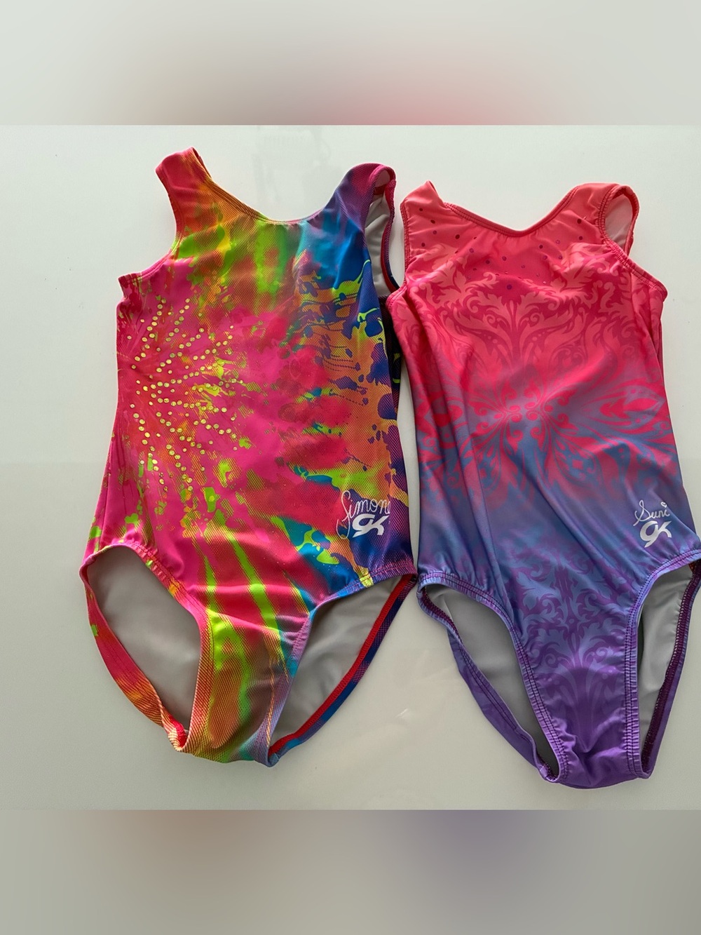 GK elite Simone and Suni leotards bundle child medium